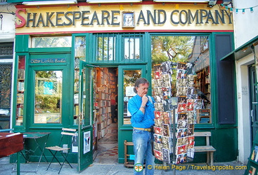 Tony, checking out the postcards at Shakespeare and Co